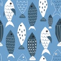 Cute vector seamless pattern with hand drawn fishes in blue tones. Royalty Free Stock Photo